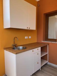 Kuchyň nebo kuchyňský kout v ubytování CASA FANNI- rooms