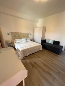 Postel nebo postele na pokoji v ubytování CASA FANNI- rooms + 26 fotografií