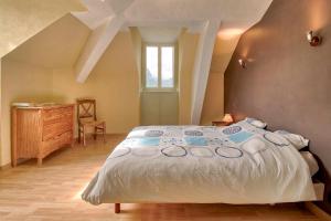 Postel nebo postele na pokoji v ubytování Au Nid Du Gypaéte Oiseau Local