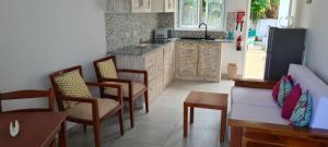 Kuchyň nebo kuchyňský kout v ubytování Harmony Self-Catering Apartments