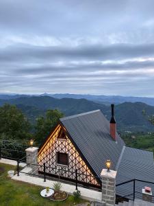 a house with a view of the mountains at VİRA TAŞ KONAK in Trabzon