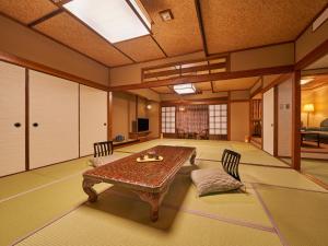 Posezení v ubytování Ooedo Onsen Monogatari Ureshinokan