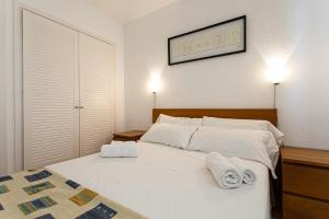 A bed or beds in a room at INMUEBLE DE CATEGORIA. Wifi FREE