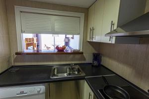 A kitchen or kitchenette at INMUEBLE DE CATEGORIA. Wifi FREE