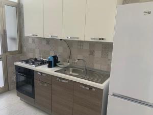 Η κουζίνα ή μικρή κουζίνα στο HOLIDAY PATRIZIA'S HOME 2.0 +16 φωτογραφίες