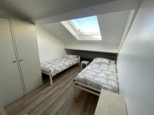 Voodi või voodid majutusasutuse Bohobos Hostel toas