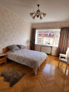 Postel nebo postele na pokoji v ubytování Spacious old town apartment in heart of Tallinn