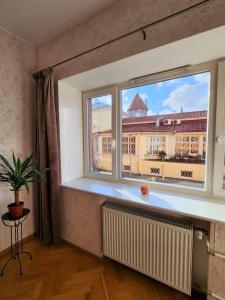 TV a/nebo společenská místnost v ubytování Spacious old town apartment in heart of Tallinn