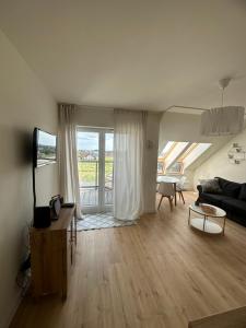 Μια τηλεόραση ή/και κέντρο ψυχαγωγίας στο Apartament Koncertowa