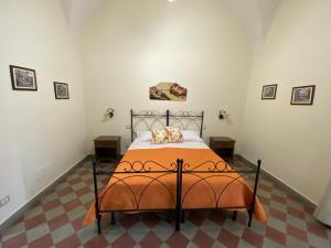 Posteľ alebo postele v izbe v ubytovaní B&B Palazzo Tornabene