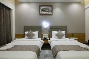 HOTEL AURELLIA客房内的一张或多张床位