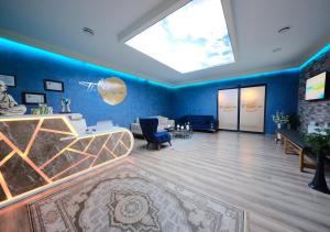 a large living room with a large skylight at The Sunshine Otel & SPA in Istanbul