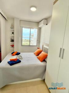 Postel nebo postele na pokoji v ubytování APARTBEACH ADRIATICO 518 VISTAS PLAYA y CLIMATIZADO