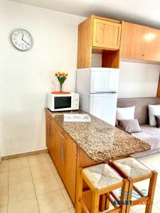 Kuchyň nebo kuchyňský kout v ubytování APARTBEACH ADRIATICO 518 VISTAS PLAYA y CLIMATIZADO