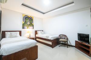 Kama o mga kama sa kuwarto sa Reef Villa - 3BR Private Pool Sanur Beach