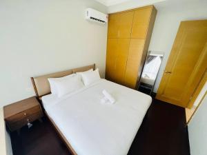 R&F PRINCESS COVE at ANJU客房内的一张或多张床位