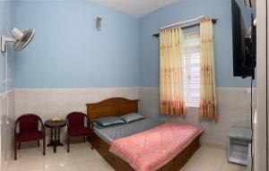 Giường trong phòng chung tại Homestay VT