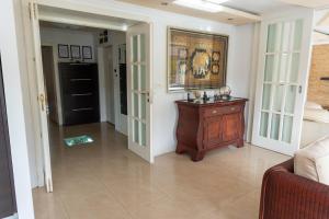 a living room with a couch and a table at Sweet House Parlament Lux in Belgrade +44 photos