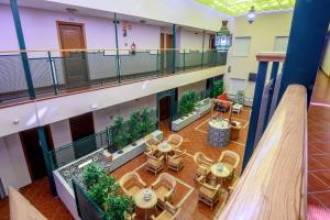 an overhead view of a hotel lobby with tables and chairs at Hotel H28 Camas in Camas