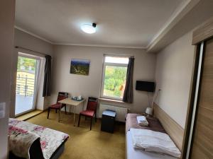 Posteľ alebo postele v izbe v ubytovaní 4family *RESORT*SPA*