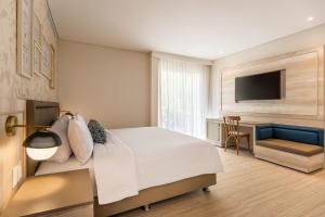 Postel nebo postele na pokoji v ubytování Ermita Cartagena, a Tribute Portfolio Hotel