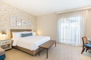 Postel nebo postele na pokoji v ubytování Ermita Cartagena, a Tribute Portfolio Hotel