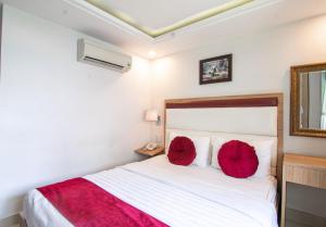 Ein Bett oder Betten in einem Zimmer der Unterkunft Diamond Hotel