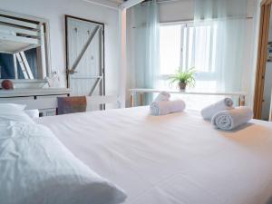 Cama ou camas em um quarto em Casanaga