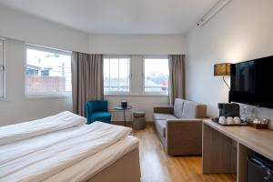 TV a/nebo společenská místnost v ubytování Quality Hotel Saga