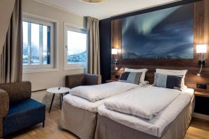 Postel nebo postele na pokoji v ubytování Quality Hotel Saga