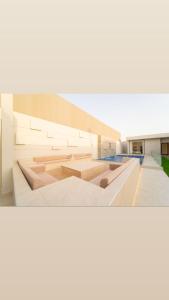 a rendering of a building with wooden floors at منتجع ريتال in Dhahran