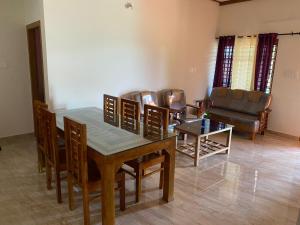 Posezení v ubytování HappyDays HomeStay Wayanad