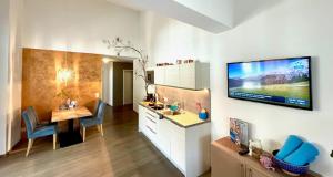 TV a/nebo společenská místnost v ubytování Aparthotel Bergtraum