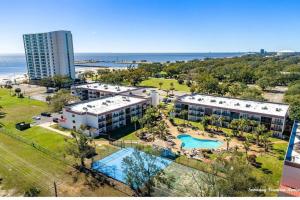 an aerial view of a resort with a swimming pool at Biloxi Beach-Good Vibes Condo in Biloxi