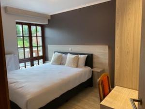 Postel nebo postele na pokoji v ubytování Hotel IL Castellino + 37 fotografií
