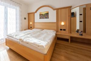 Postel nebo postele na pokoji v ubytování Villa Gemmy