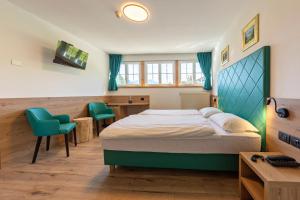 Postel nebo postele na pokoji v ubytování Villa Gemmy