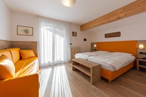 Postel nebo postele na pokoji v ubytování Villa Gemmy