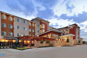 eine Darstellung der Vorderseite eines Hotels in der Unterkunft Residence Inn by Marriott Houston Tomball in Tomball