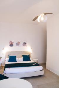 Postel nebo postele na pokoji v ubytování B&B Jolie Suite