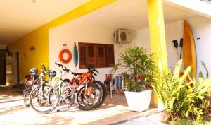 a group of bikes parked outside of a building at Pousada Pura Vida in Barreirinhas