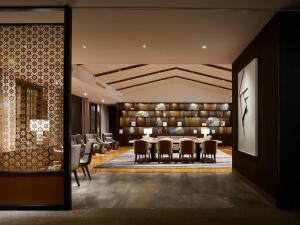 a dining room with a table and chairs at Hotel The Celestine Tokyo Shiba in Tokyo