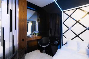 Postel nebo postele na pokoji v ubytování Tsarsky Hotel