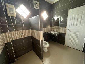 Koupelna v ubytování Nuttida resort ณัฐธิดา รีสอร์ท