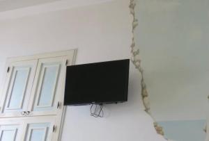 TV a/nebo společenská místnost v ubytování Sunset le Sirene
