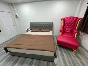 Postel nebo postele na pokoji v ubytování Nuttida resort ณัฐธิดา รีสอร์ท