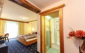 Postel nebo postele na pokoji v ubytování Hochwart Hof Bed & Breakfast