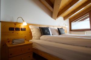 Postel nebo postele na pokoji v ubytování Hotel Belfiore
