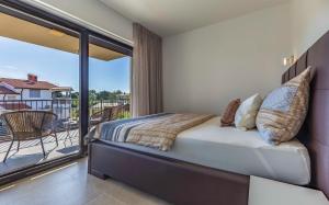 En balkon eller terrasse på AP Caci mit Pool - istriensonne 0712-0737