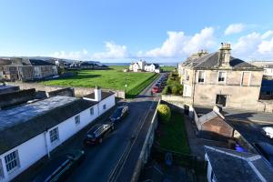 an aerial view of a city street with buildings at Pladda View in Ayr
